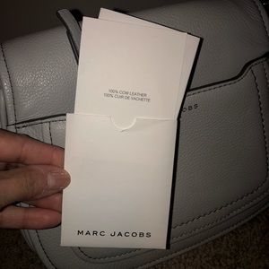 Marc Jacobs cross body bag. Carried once- non-smoking, pet free home.